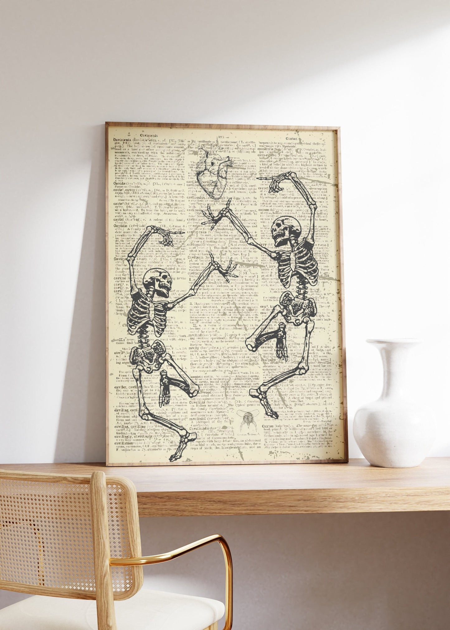 Two Skeletons Dancing Printed On An Antique Old Dictionary Page